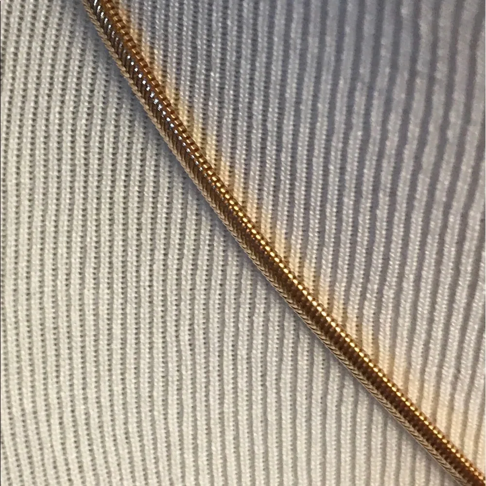 N/A goldtone white